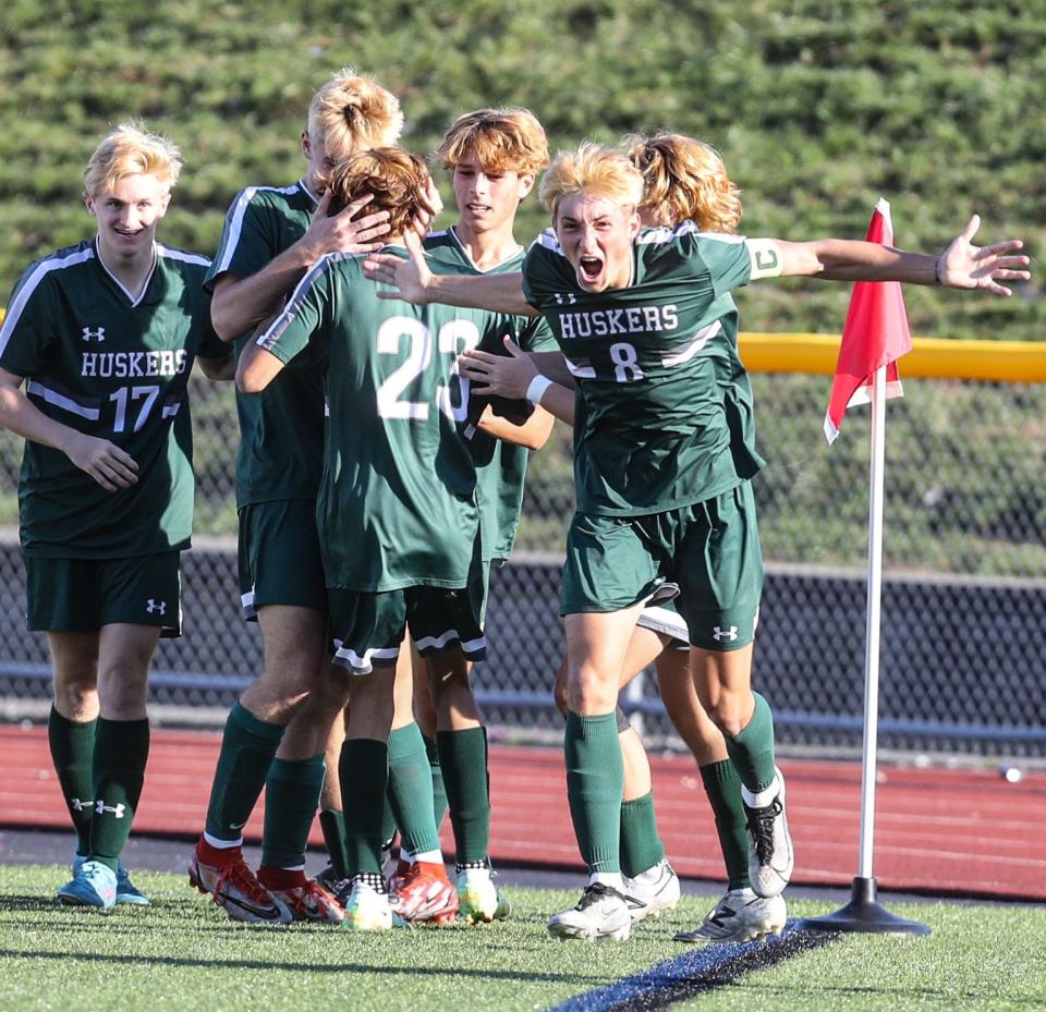 Yorktown celebrates a goal by Nick Varela (number 23) during the Section 1 Class A soccer championship game against Tappan Zee at Lakeland High School Oct. 30, 2022. Yorktown defeated Tappan Zee 3-0.
