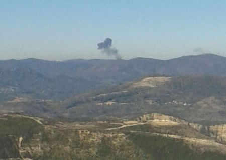 Some rises over a mountainous area in northern Syria after a war plane was shot down by Turkish fighter jets near the Turkish-Syrian border November 24, 2015. REUTERS/Sadettin Molla