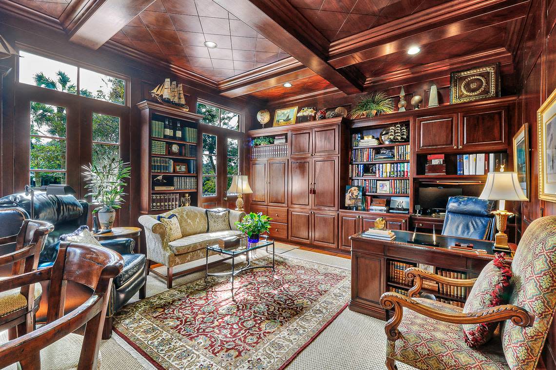 The study of 32 W. Beach Lagoon Rd. is bathed in Mahogany from the cabinets to the ceiling and at one end features a wine cellar and tasting room with iron work that came from the Paris Flea Market.