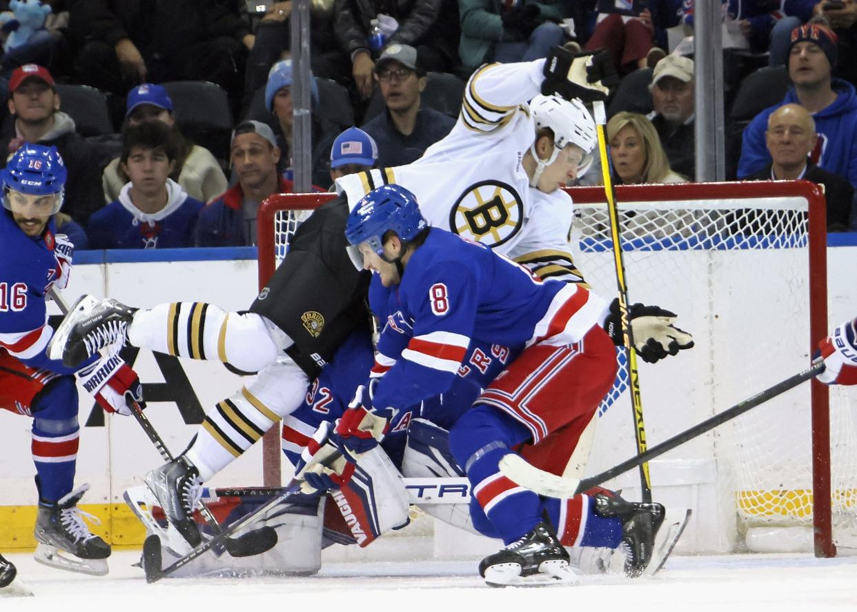 NEW YORK, NEW YORK - NOVEMBER 25: Danton Heinen #43 of the Boston Bruins is called for goaltender interference during the second period against Jacob Trouba #8 and the New York Rangers at Madison Square Garden on November 25, 2023 in New York City.
