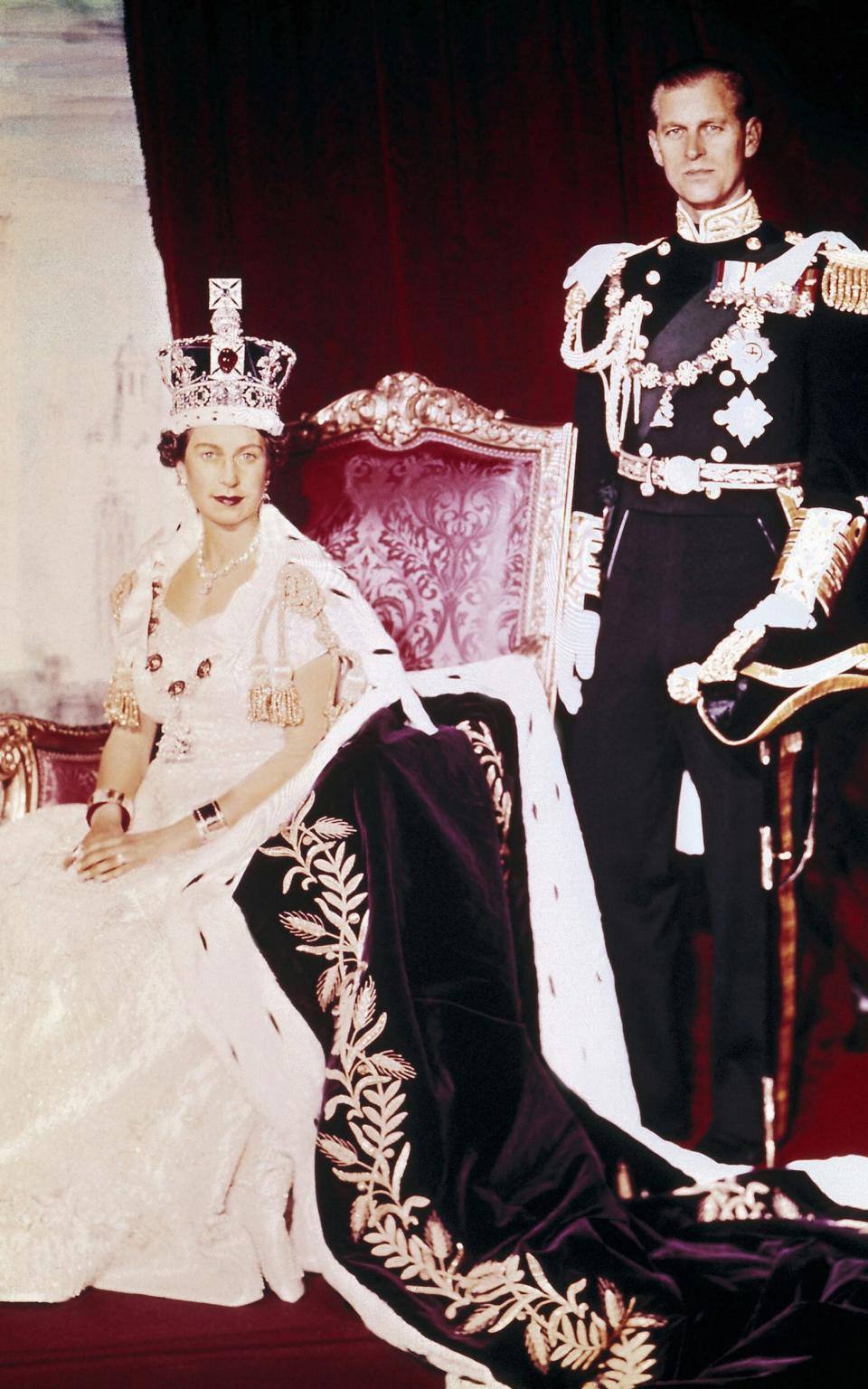 Queen Elizabeth II and the Duke of Edinburgh pose on the Queen's Coronation day - Credit: AFP