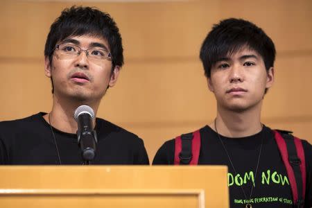 Hong Kong Federation of Students' Secretary-general Alex Chow (L) and Deputy Secretary-general Lester Shum attend a news conference after meeting with senior Hong Kong government officials in Hong Kong October 21,2014. REUTERS/Tyrone Siu