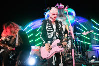 <p>MGK graced the stage during a performance in Malibu, California, embracing the spirit of spooky season in a skeleton zip-up and full face mask with bull horns.</p>