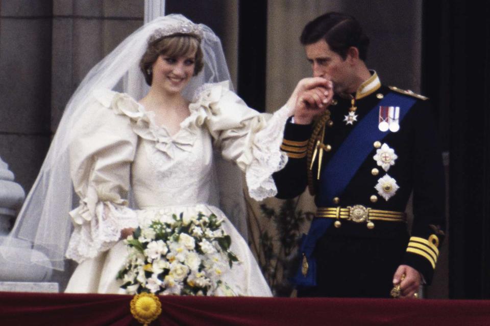 <p>Terry Fincher/Princess Diana Archive/Getty </p> Princess Diana and now-King Charles at their July 1981 wedding day