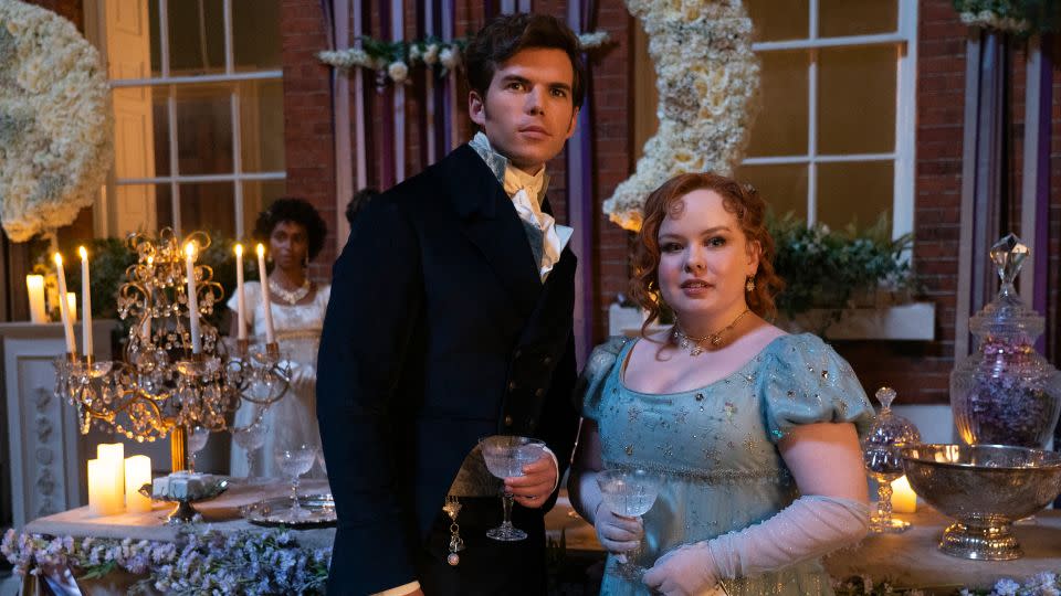 (From left) Luke Newton as Colin Bridgerton, Nicola Coughlan as Penelope Featherington in "Bridgerton." - Liam Daniel/Netflix