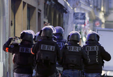 Members of French special police forces of Research and Intervention Brigade (BRI) attend a police operation the day after a shooting in Strasbourg, France, December 12, 2018. REUTERS/Vincent Kessler