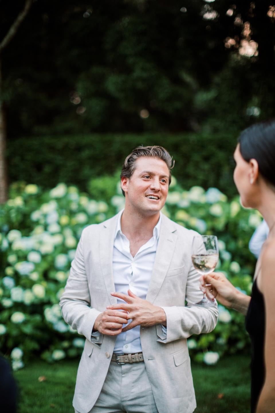 The Bride and Groom Said Their Vows Beneath a Floral Chuppah at This Hamptons Backyard Wedding