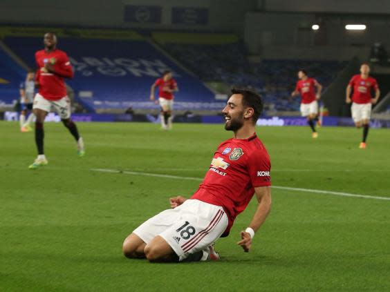 Bruno Fernandes celebrates after scoring United’s third goal (Getty)