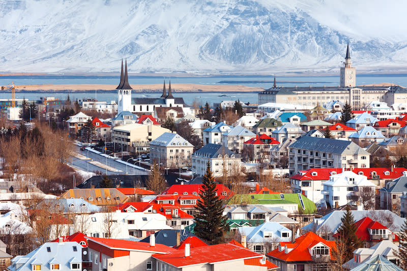 <p>We challenge you to name a more apt city break than Reykjavík in the autumn months. Iceland’s capital is always abuzz with visitors regardless of the season but its colour-block houses and bustling bakeries give it serious appeal for those on the lookout for a cosy weekend away.<br>Millennials can be found supping coffee at the <a rel="nofollow noopener" href="https://sandholt.is/" target="_blank" data-ylk="slk:SandHolt;elm:context_link;itc:0;sec:content-canvas" class="link ">SandHolt</a> bakery while raincoat-clad hikers can be spotted by the famous cathedral. The city can be tackled in 24 hours so hire a car and hit the open road for picture-perfect waterfalls, shetland ponies and hot springs on route.<br>Stay at the <a rel="nofollow noopener" href="https://www.sandhotel.is/en/forsida/" target="_blank" data-ylk="slk:Sand Hotel;elm:context_link;itc:0;sec:content-canvas" class="link ">Sand Hotel</a> to be in the midst of the action or book a pod via <a rel="nofollow noopener" href="https://www.airbnb.co.uk/rooms/21575107" target="_blank" data-ylk="slk:Airbnb;elm:context_link;itc:0;sec:content-canvas" class="link ">Airbnb</a> for a chance to see the northern lights. <em>[Photo: Getty]</em> </p>