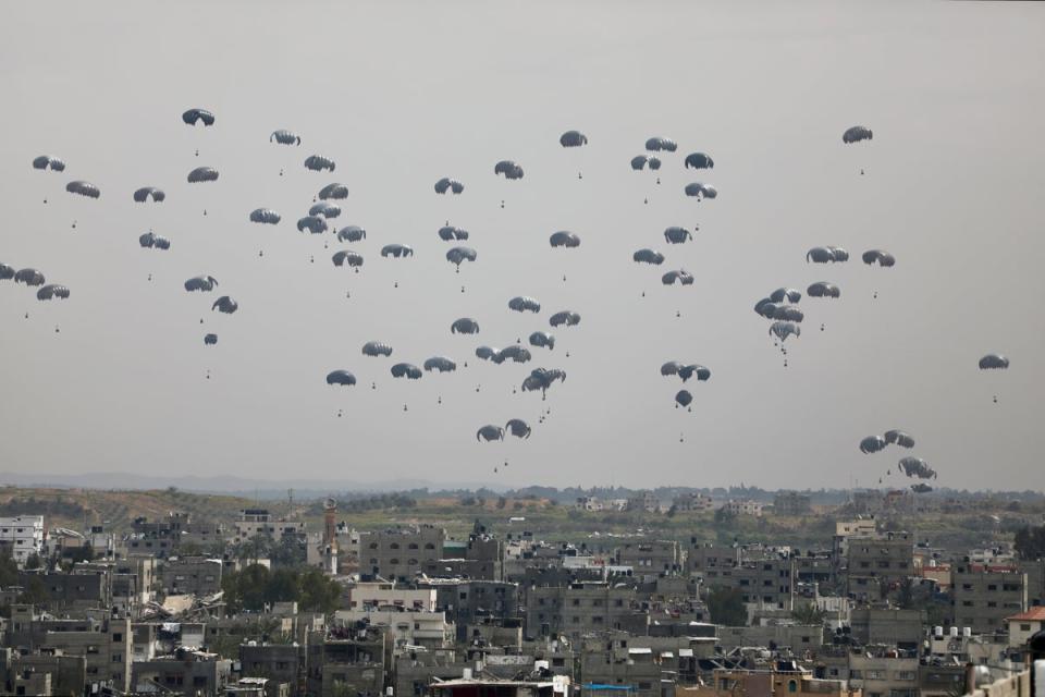 Humanitarian aid is airdropped to Palestinians in Gaza City, northern Gaza (AP)