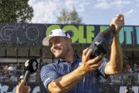 First-place individual champion Captain Bryson DeChambeau, of Crushers GC, celebrates on the 18th green after winning during the final round of LIV Golf Chicago at Rich Harvest Farms, Sunday, Sept. 24, 2023, in Sugar Grove, Ill. (Chris Trotman/LIV Golf via AP)