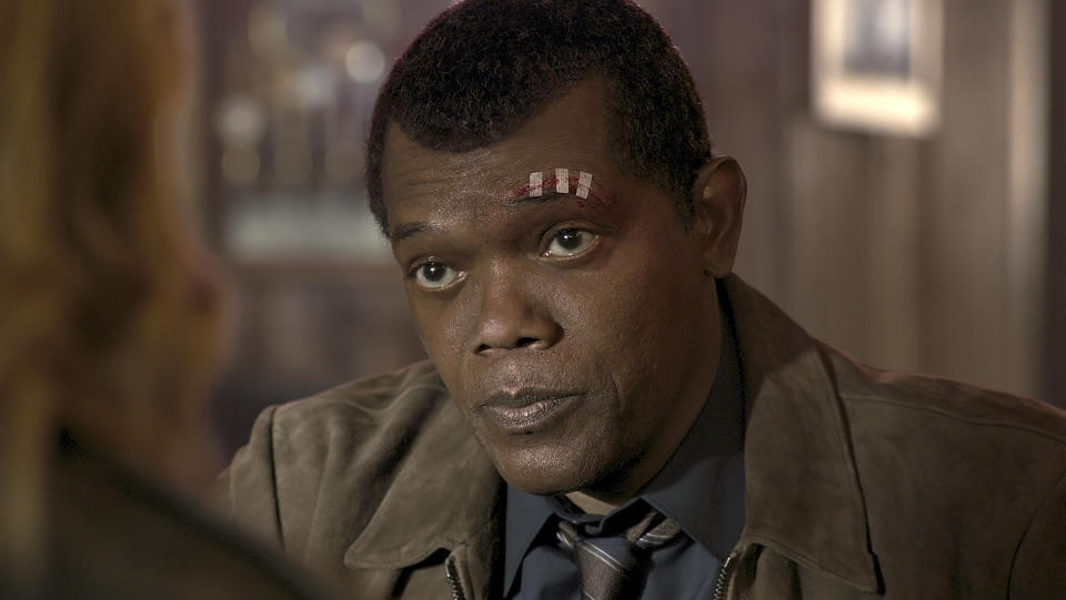 This image released by Disney-Marvel shows Samuel L. Jackson as a younger Nick Fury in a scene from "Captain Marvel. New digital de-aging techniques have shaved decades from Jackson's face. (Disney/Marvel Studios via AP)