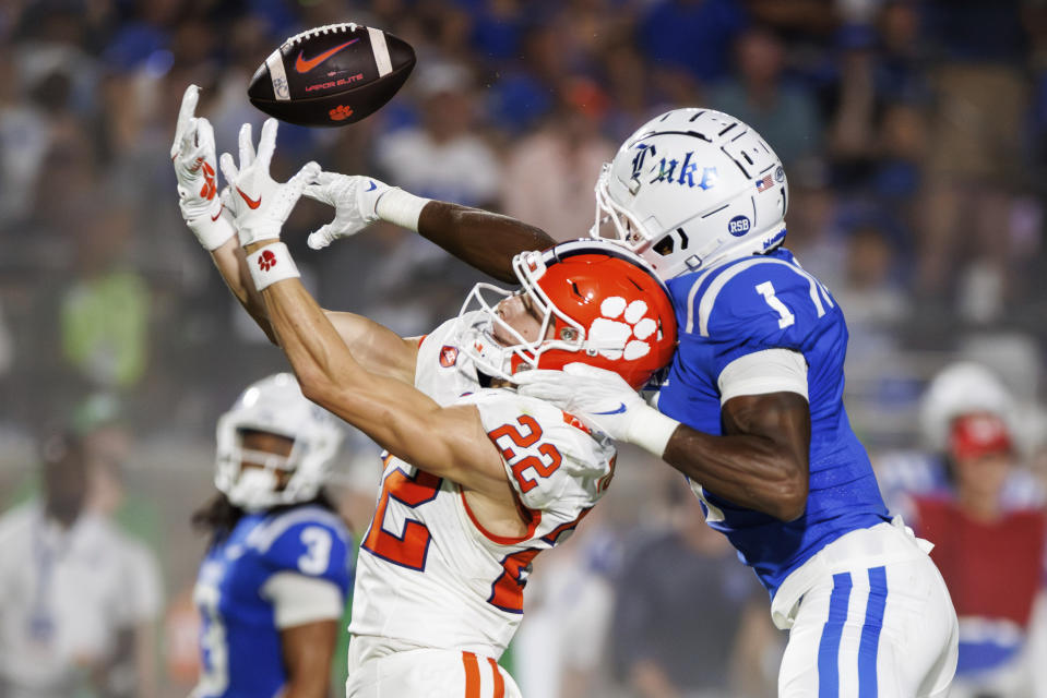 Duke's Myles Jones (1) breaks up a pass intended for Clemson's Cole Turner (22) during Monday's game in Durham, N.C. (AP Photo/Ben McKeown)