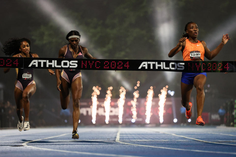 Marie-Josee Ta Lou-Smith (Ivory Coast) wins the 100m. (Patrick Smith/Getty Images for Athlos)