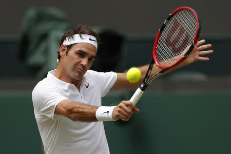 Britain Tennis - Wimbledon - All England Lawn Tennis & Croquet Club, Wimbledon, England - 4/7/16 Switzerland's Roger Federer in action against USA's Steve Johnson REUTERS/Andrew Couldridge