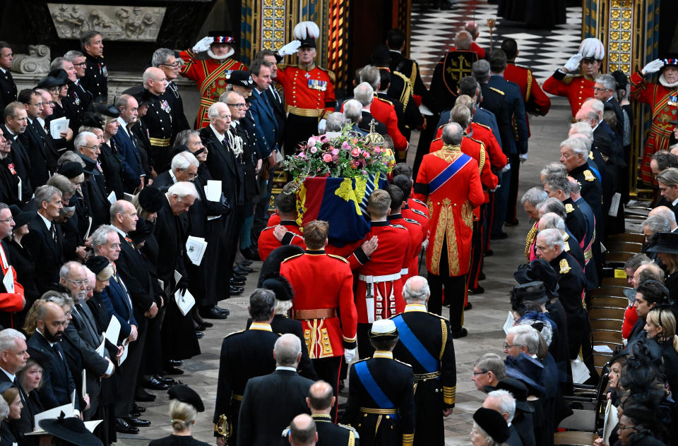 <p>The coffin of Queen Elizabeth II, with the Imperial State Crown resting on top, is carried by the Bearer Party into Westminster Abbey during the State Funeral of Queen Elizabeth II on Sept. 19, 2022 in London, England. Elizabeth Alexandra Mary Windsor was born in Bruton Street, Mayfair, London on April 21, 1926. She married Prince Philip in 1947 and ascended the throne of the United Kingdom and Commonwealth on Feb. 6, 1952 after the death of her father, King George VI. Queen Elizabeth II died at Balmoral Castle in Scotland on Sept. 8, 2022, and is succeeded by her eldest son, King Charles III. (Photo by Gareth Cattermole/Getty Images)</p> 