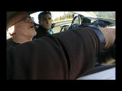 In this cropped screen grab from a bodycam video provided by the Hancock County Sheriff's Office, Bryan Kohberger, left, and his father are seen talking to a sheriff's deputy during a traffic stop on Thursday, Dec. 15, 2022, in Hancock County, Ind. Bryan Kohberger, accused in the November slayings of four University of Idaho students has left a Pennsylvania jail in the custody of state police, officials said Wednesday, Jan. 4, 2023, which means he could be headed to Idaho to face first-degree murder charges.(Hancock County Sheriff's Office via AP)