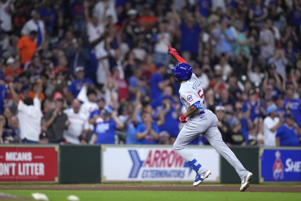 Chicago Cubs' Christopher Morel celebrates after hitting a three-run home run against the Houston Astros during the fourth inning of a baseball game Monday, May 15, 2023, in Houston. (AP Photo/David J. Phillip)