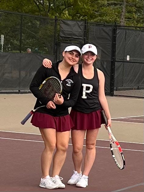 Portsmouth's Mia Edwards and Avery Porter each won their respective singles match, and paired up to win a doubles match in Wednesday's Division II playoff win over Hollis-Brookline.