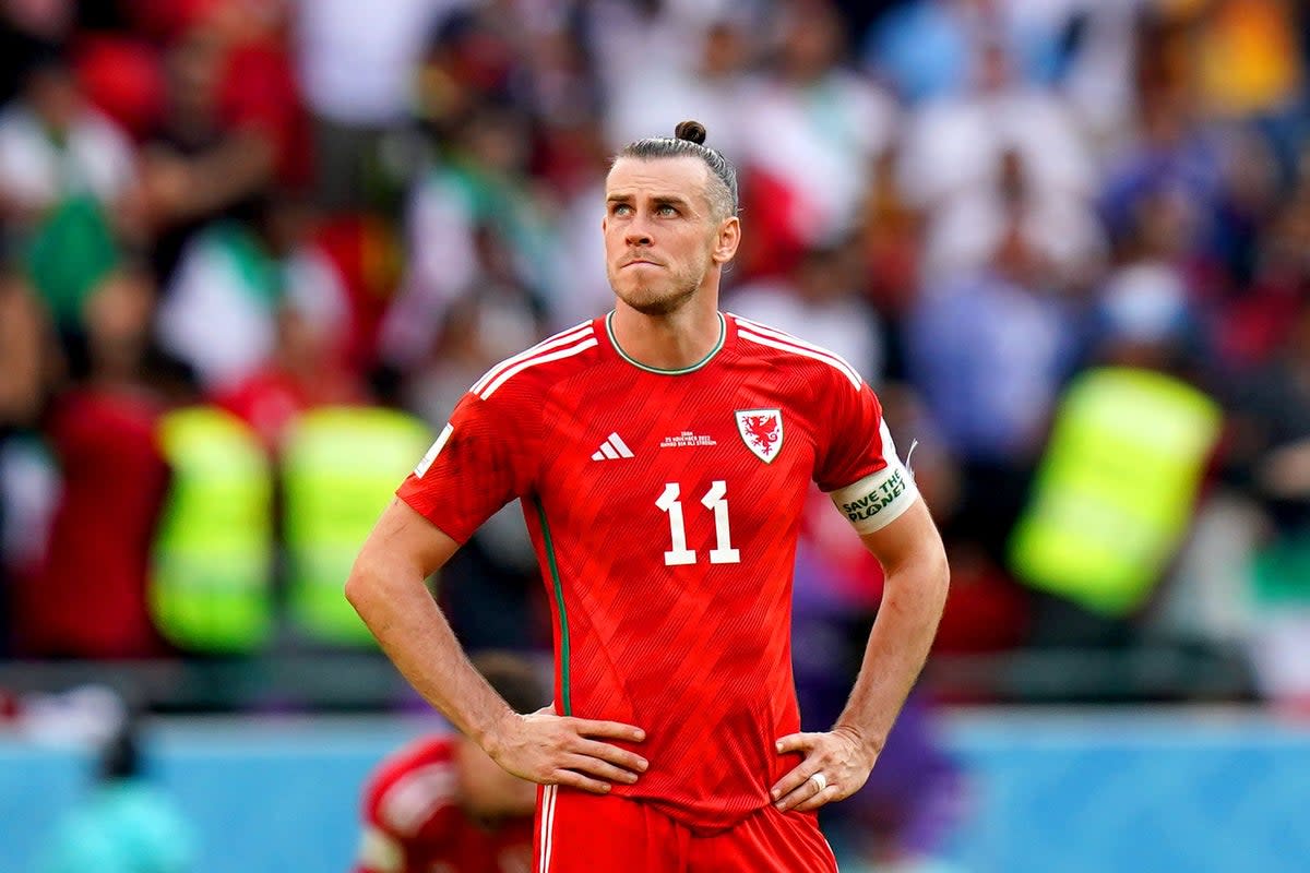Wales’ Gareth Bale appears dejected during the FIFA World Cup Group B match at the Ahmad Bin Ali Stadium, Al-Rayyan. Picture date: Friday November 25, 2022. (PA Wire)