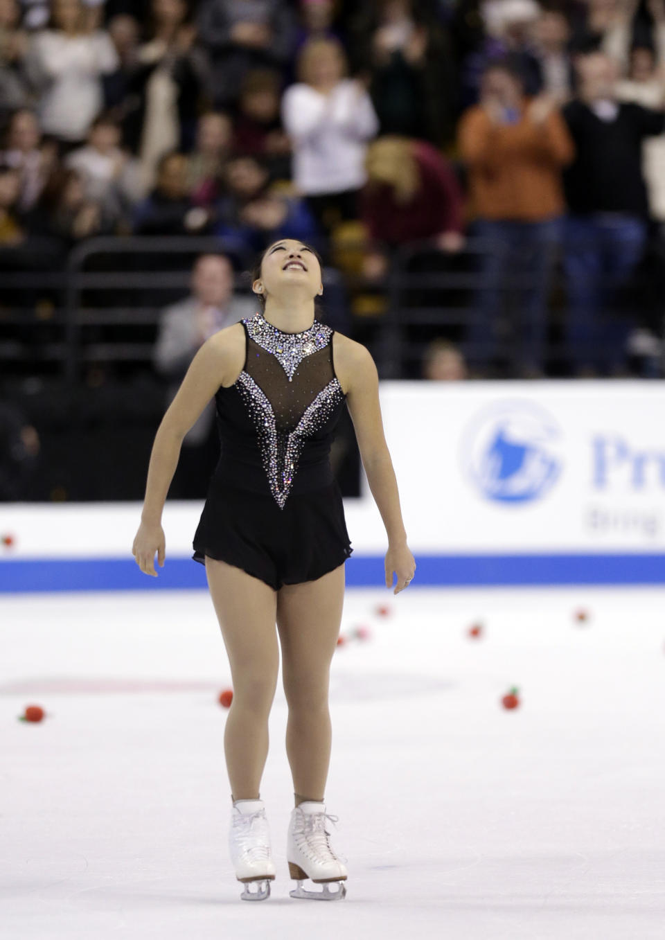 Mirai Nagasu reacts after skating in the women's free skate at the U.S. Figure Skating Championships Saturday, Jan. 11, 2014 in Boston. (AP Photo/Steven Senne)