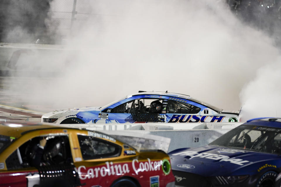 Kevin Harvick (4) celebrates a win at the NASCAR Cup Series auto race, Sunday, Sept. 6, 2020, in Darlington, S.C. (AP Photo/Chris Carlson)