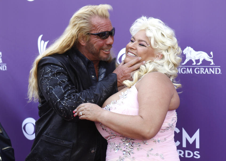 Duane and Beth Chapman arrive at the 48th ACM Awards in Las Vegas, April 7, 2013.  REUTERS/Steve Marcus (UNITED STATES  - Tags: ENTERTAINMENT)  