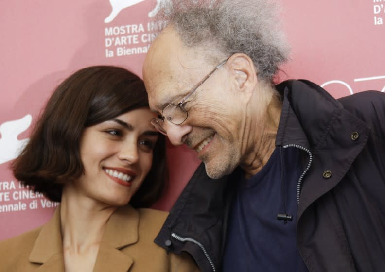 Actress Shannyn Sossamon and director Monte Hellman pose at the photo call for the film Road To Nowhere at the 67th edition of the Venice Film Festival in Venice, Italy, Friday, Sept. 10, 2010. (AP Photo/Joel Ryan)