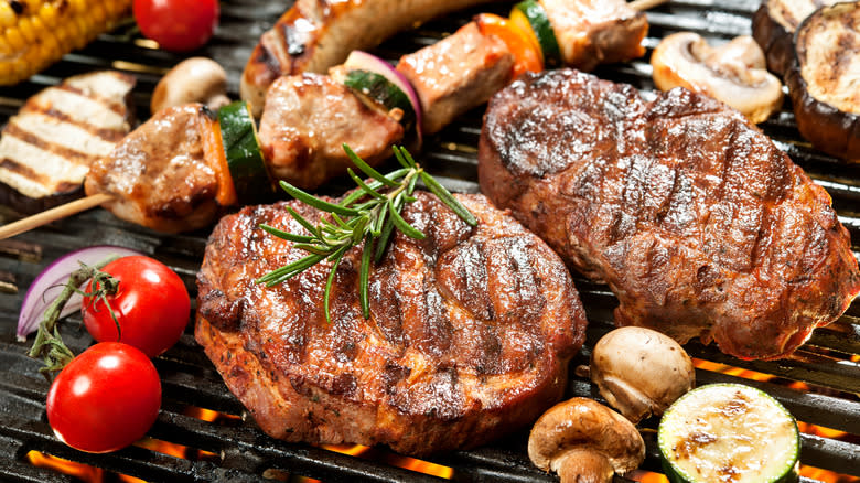 Meat and vegetables on grill 