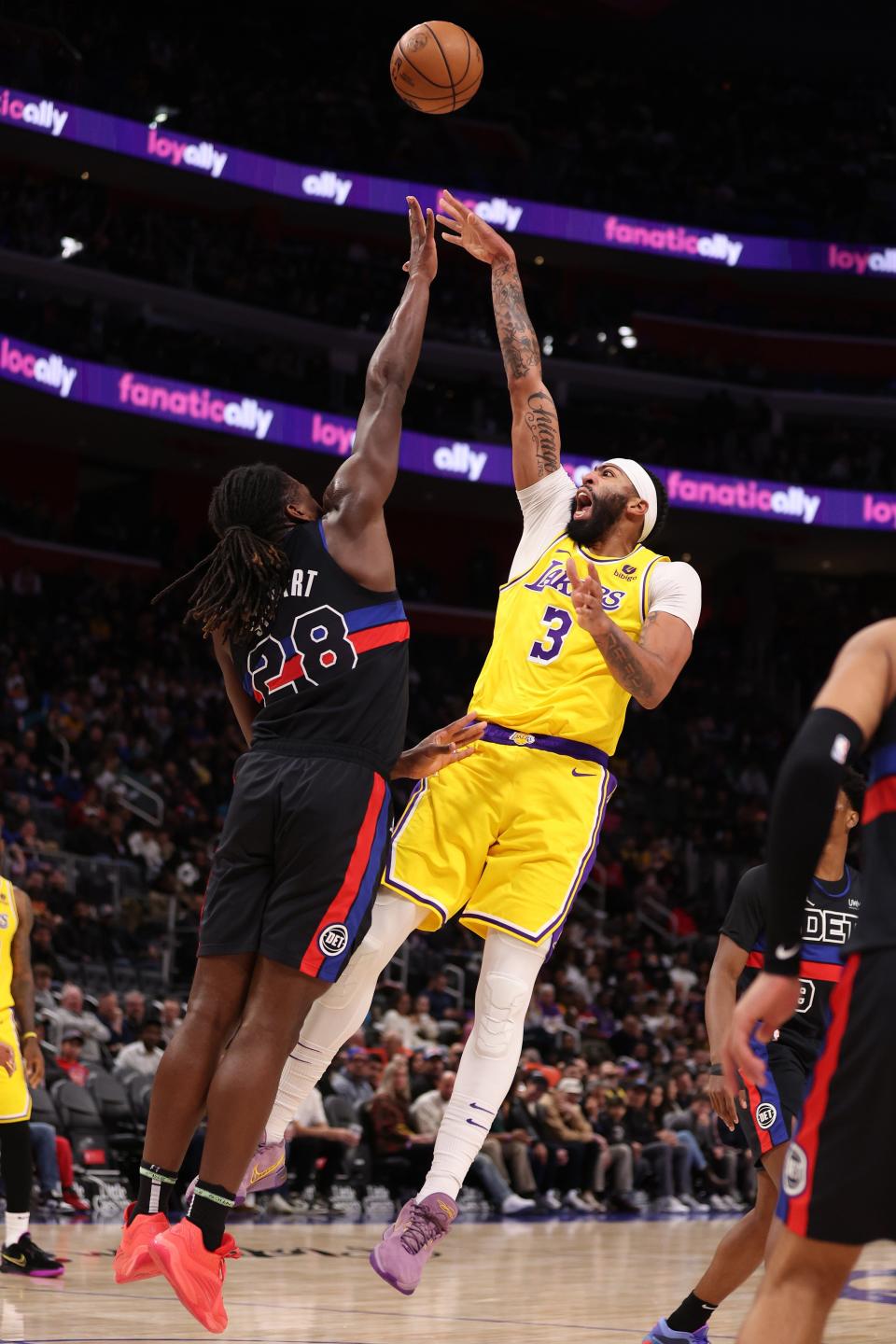 Lakers forward Anthony Davis takes a shot over Pistons forward Isaiah Stewart during the first half on Wednesday, Nov. 29, 2023, at Little Caesars Arena.