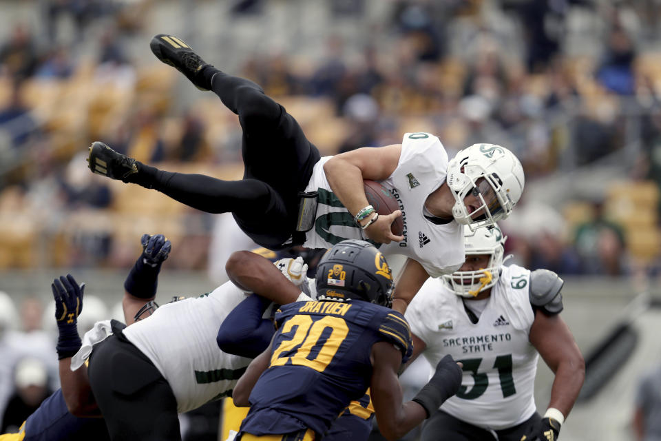 Sacramento State quarterback Asher O'Hara (10) leaps for a touchdown against California during the first half of an NCAA college football game on Saturday, Sept. 18, 2021, in Berkeley, Calif. (AP Photo/Jed Jacobsohn)