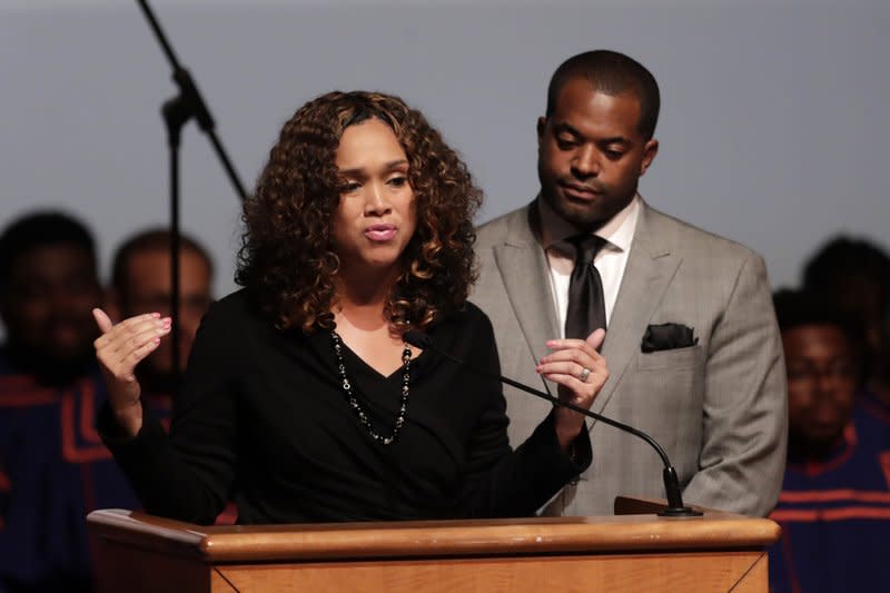 In this Wednesday, Oct. 23, 2019 file photo, Maryland State Attorney Marilyn Mosby, left, speaks while standing next to her husband, Maryland Assemblyman Nick Mosby, during a viewing service for the late U.S. Rep. Elijah Cummings at Morgan State University in Baltimore. (AP Photo/Julio Cortez, File)