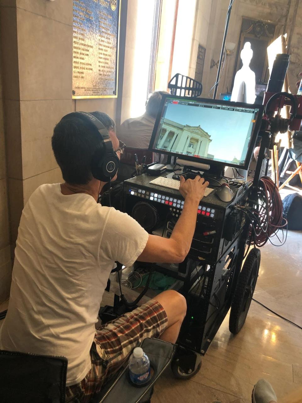 Shea Grauer on the set of "Bluff City Law." Grauer, a longtime Beauty Shop manager, served as a video playback camera operator.