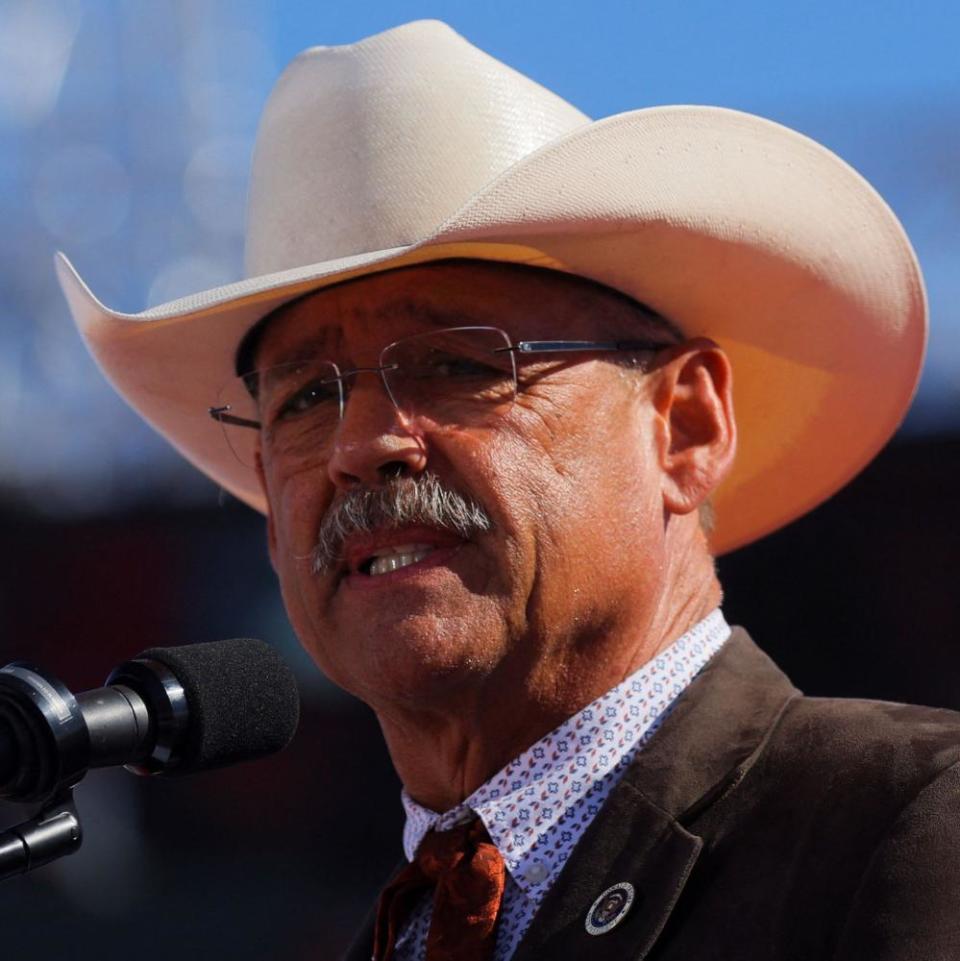 Arizona Republican candidate for Secretary of State Mark Finchem (R-AZ) speaks on stage before a rally ahead of the midterm elections in Mesa, Arizona, U.S., October 9, 2022.