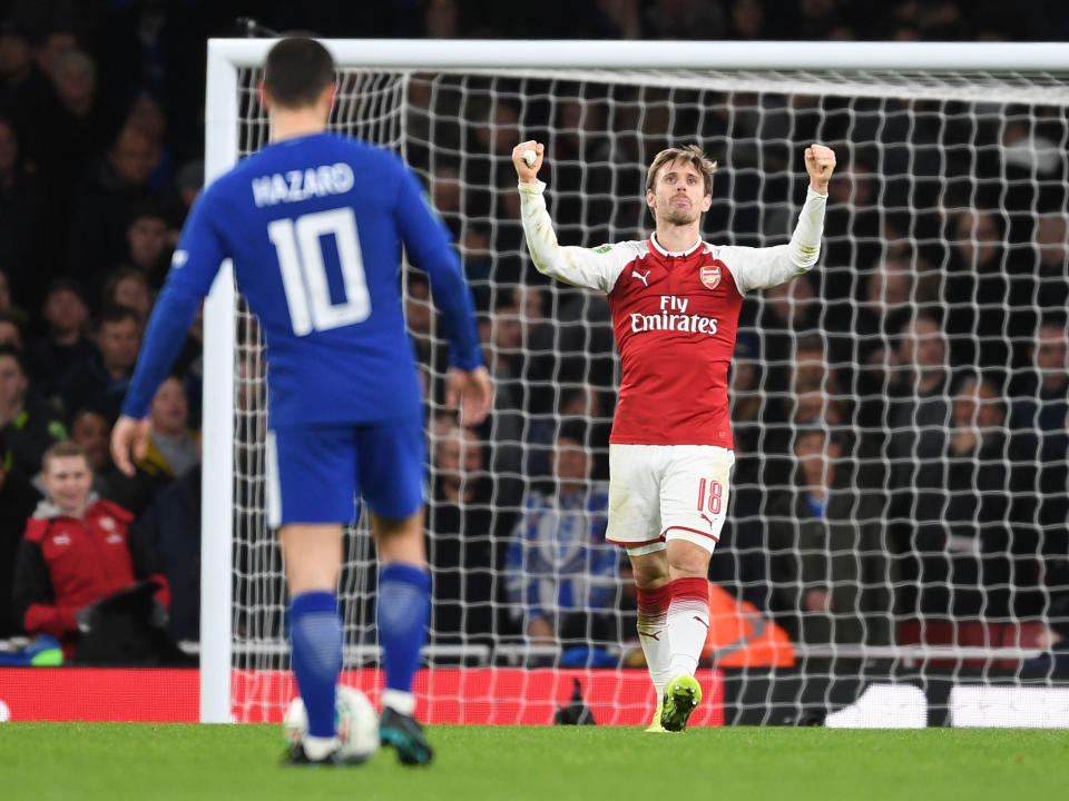 Nahco Monreal, Arsenal's unlikely but indispensable hero, celebrates the 2-1 victory over Chelsea: Getty