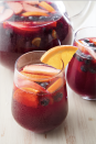 <p>Our classic version of sangria is light and bubbly with an addition of seltzer water and the perfect ratio of wine to brandy. Skip the summer berries and swap in fall fruits like pears and apples to keep enjoying this summer classic all year long.</p><p>Get the <strong><a href="https://www.delish.com/cooking/recipe-ideas/a19601715/easy-red-sangria-recipe/" rel="nofollow noopener" target="_blank" data-ylk="slk:Red Sangria recipe;elm:context_link;itc:0;sec:content-canvas" class="link ">Red Sangria recipe</a></strong>. </p>