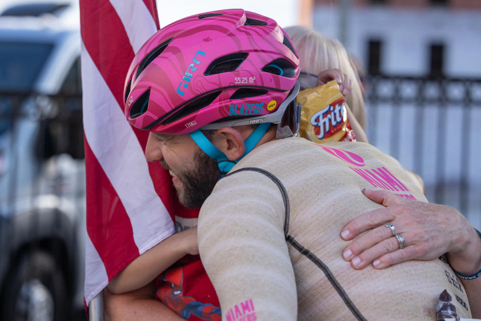Recently-crowned US Elite National Criterium Champion, Brandon Feehery, gets a pre-race hug from his mother Brenda