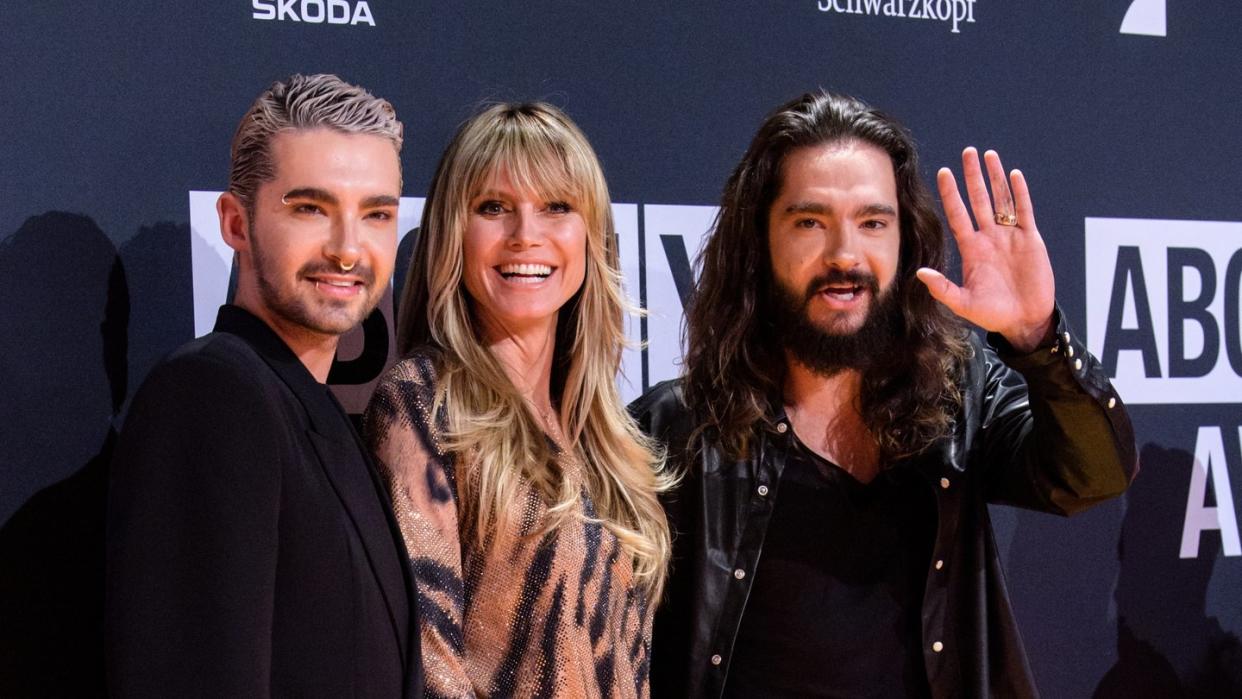 Bill Kaulitz, Heidi Klum und Tom Kaulitz bei der Verleihung der About You Awards. Foto: Matthias Balk