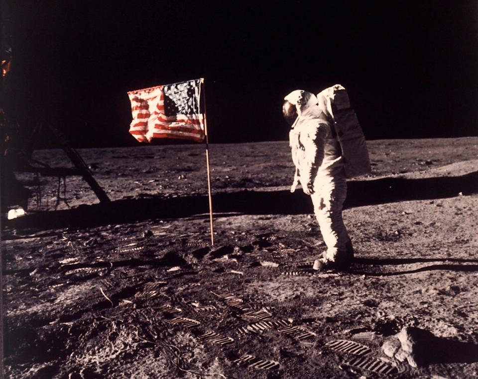 In this image provided by NASA, astronaut Buzz Aldrin poses for a photograph beside the U.S. flag deployed on the moon during the Apollo 11 mission on July 20, 1969.