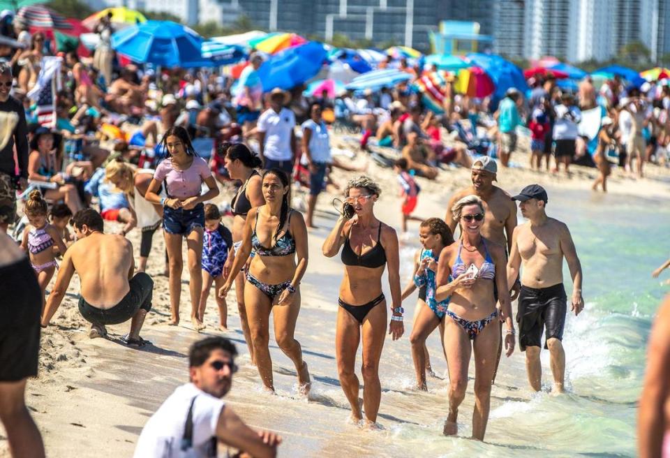 Beachgoers enjoy a beautiful weather at the Hyundai Air & Sea Show in Miami Beach on Saturday May 28, 2022.