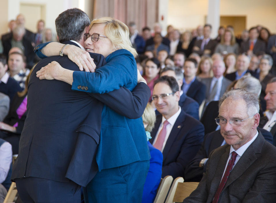 PORTLAND, ME - JANUARY 27: Maine Governor Janet Mills hugs Tilson CEO Josh Broder after he spoke during a press conference at the Portland Ocean Gateway, about Northeastern University's future technology education center in Portland, on Monday, January 27, 2020. Tech entrpreneur David Roux of Lewiston, who is funding the project, looks on at right. (Photo by Carl D. Walsh/Portland Press Herald via Getty Images)