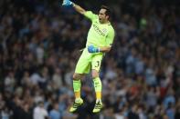 Britain Soccer Football - Manchester City v Borussia Monchengladbach - UEFA Champions League Group Stage - Group C - Etihad Stadium, Manchester, England - 14/9/16 Manchester City's Claudio Bravo celebrates their third goal Reuters / Phil Noble Livepic