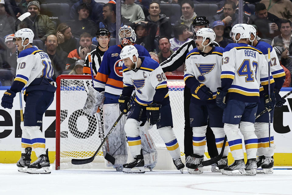 St. Louis Blues center Ryan O'Reilly (90) skates away after scoring a goal past New York Islanders goaltender Ilya Sorokin during the second period of an NHL hockey game Tuesday, Dec. 6, 2022, in Elmont, N.Y. (AP Photo/Adam Hunger)