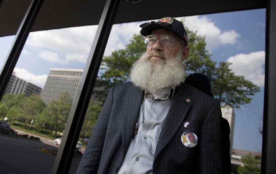 Keith Maupin, father of Sgt. Matt Maupin, is photographed, Arlington, Va.,Tuesday, May 13, 2014. A man in Iraqi custody has confessed to killing Sgt. Matt Maupin whose remains were found in 2008. Sgt. Matt Maupin, of Batavia in southwestern Ohio, was captured when insurgents with rocket-propelled grenades and small arms ambushed his fuel convoy near Baghdad on April 9, 2004. Keith Maupin decided to grow his beard until his son came home. He has never cut it. (AP Photo)