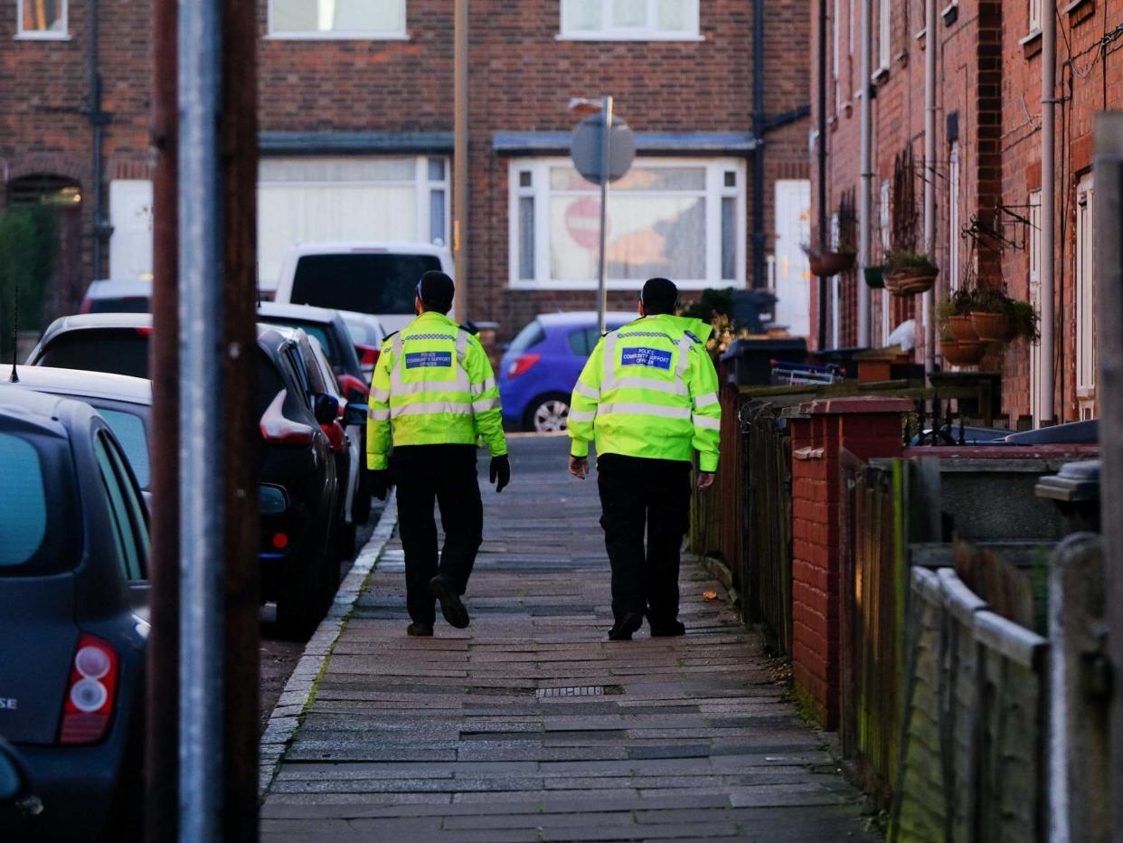 Police patrol Belper Street, in Leicester, where a 10-year-old boy was stabbed by a man in front of his mother on 18 January, 2020: SWNS