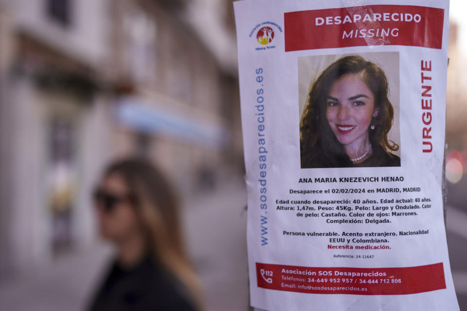 A banner of a Colombian-born American missing woman Ana Maria Knezevich Henao, 40, is displayed on a streetlight in Madrid, Spain, Friday, Feb. 16, 2024. Spanish police are looking for an Colombian-born American woman who has been reported missing in Madrid since early February. A police spokeswoman said a friend of Ana Maria Knezevich Henao, 40, filed a a missing persons complaint in a Madrid city center station on Feb. 4. (AP Photo/Manu Fernandez)