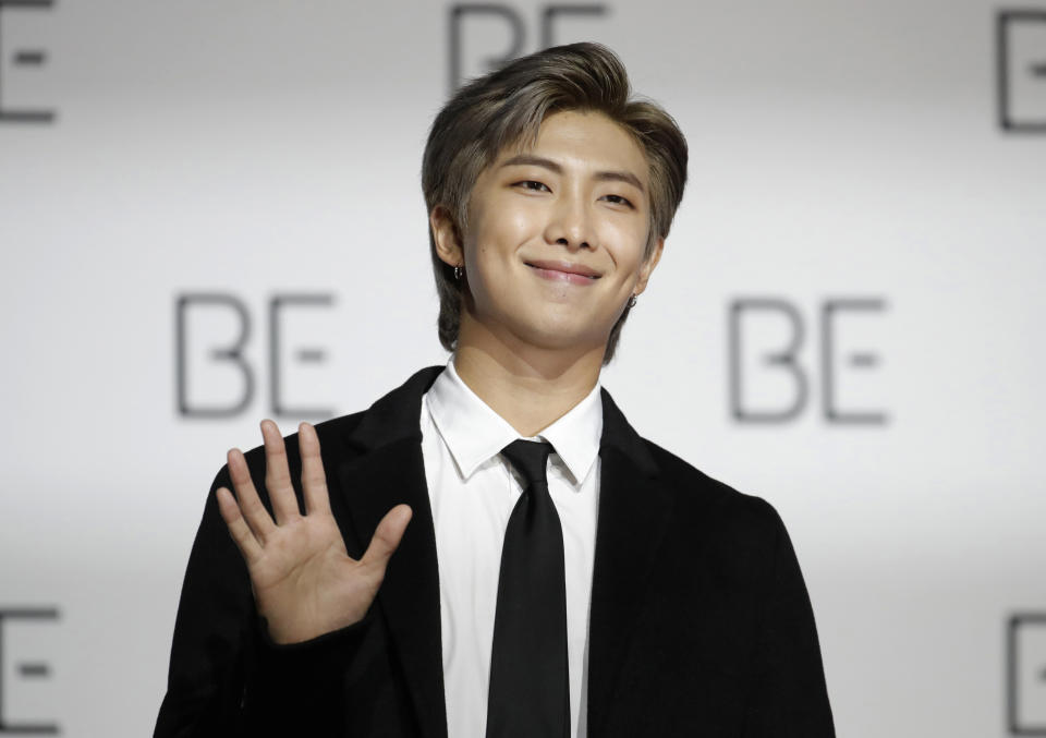 FILE - RM, a member of South Korean K-pop band BTS, poses for photographers during a press conference in Seoul, South Korea on Nov. 20, 2020. Singers RM and V of the K-pop band BTS began their mandatory military duties under South Korean law, their management agency announced Monday, Dec. 11, 2023. This came a day before two of their bandmates, Jimin and Jung Kook, were also expected to report for duty. (AP Photo/Lee Jin-man, File)