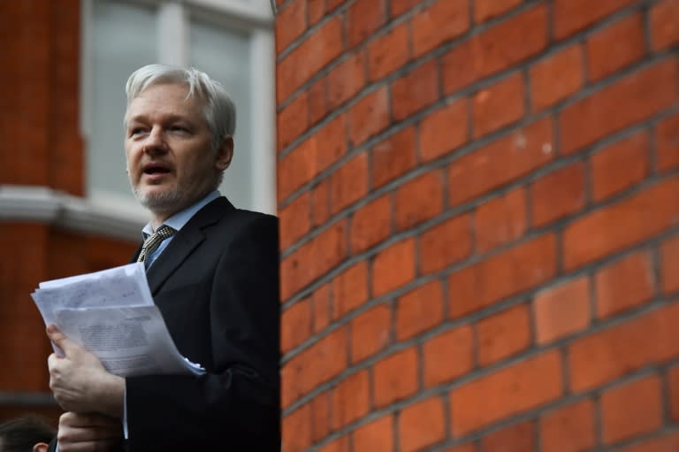 WikiLeaks founder Julian Assange addressing the media from the balcony of the Ecuadorian Embassy in central London in February 2016