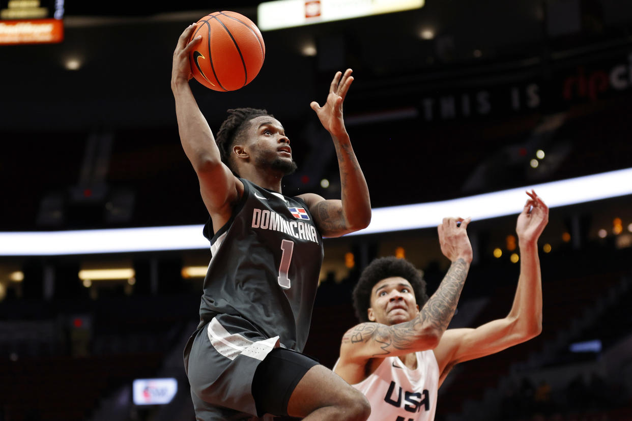 PORTLAND, OREGON - APRIL 08: Jean Montero #1 of World Team shoots against USA Team in the third quarter during the Nike Hoop Summit at Moda Center on April 08, 2022 in Portland, Oregon. (Photo by Steph Chambers/Getty Images)