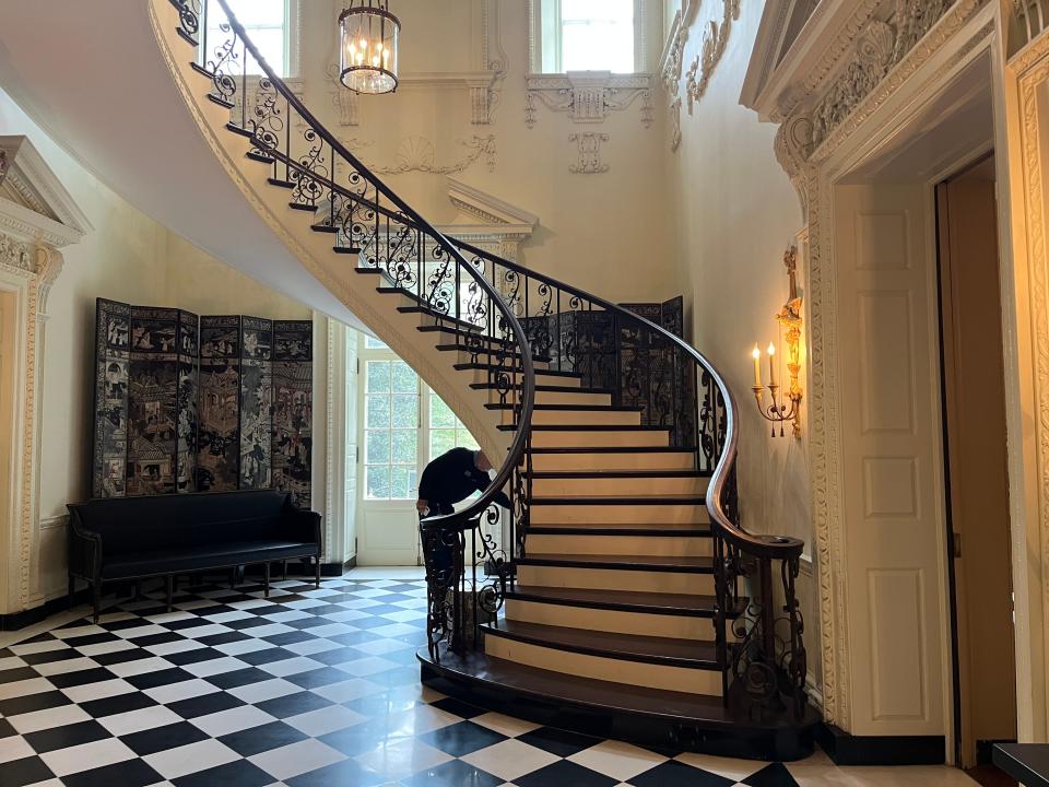 A winding staircase inside Swan House.